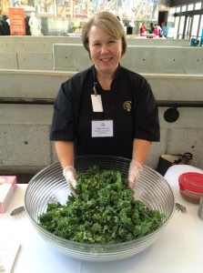 CHS Cafeteria Manager Carole Thrower prepares the kale and blueberry salad.
